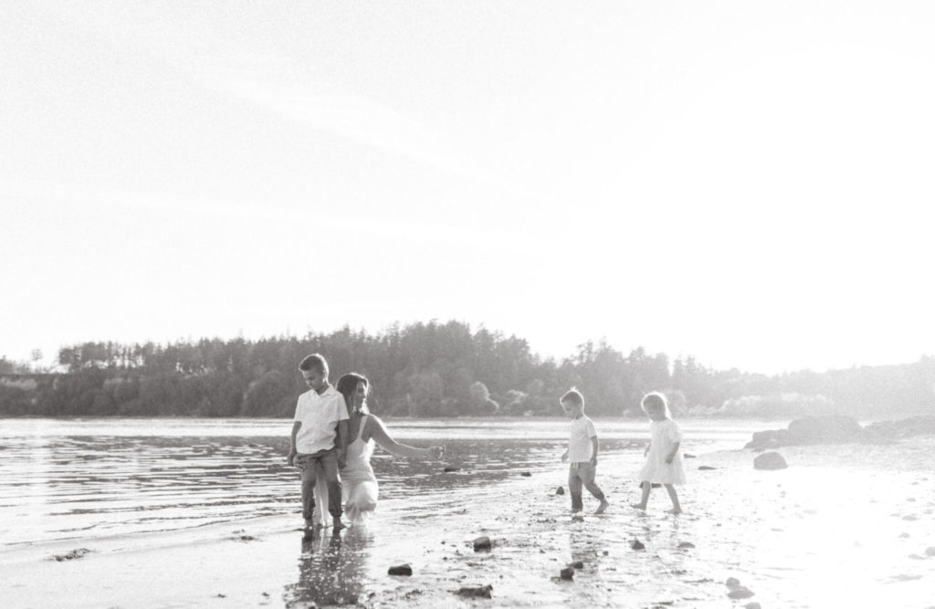 Natasha and 3 kids on the beach
