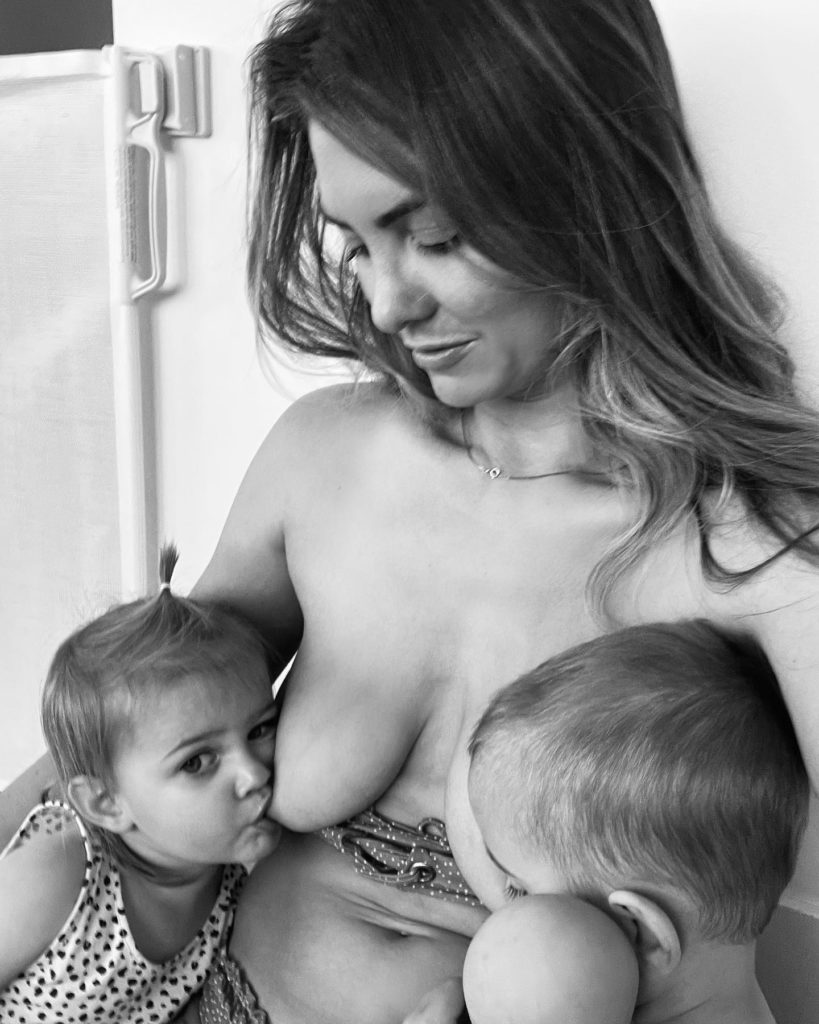 Natasha is breast feeding the twin